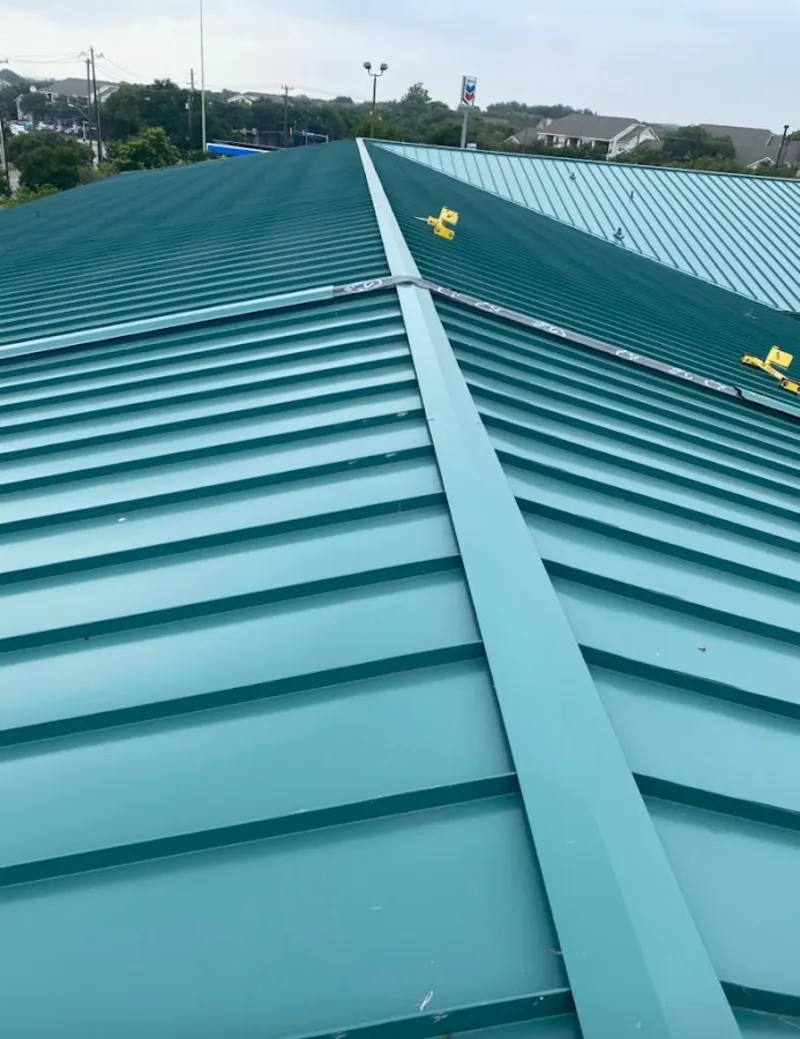 Green commercial metal roof ridge and valley for Metal Roof Repair in Upper Grand Lagoon